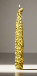 Golden Marigold Protection Ritual Candle, 8-inch soy taper candle, lit with a unique textured design for spiritual rituals.