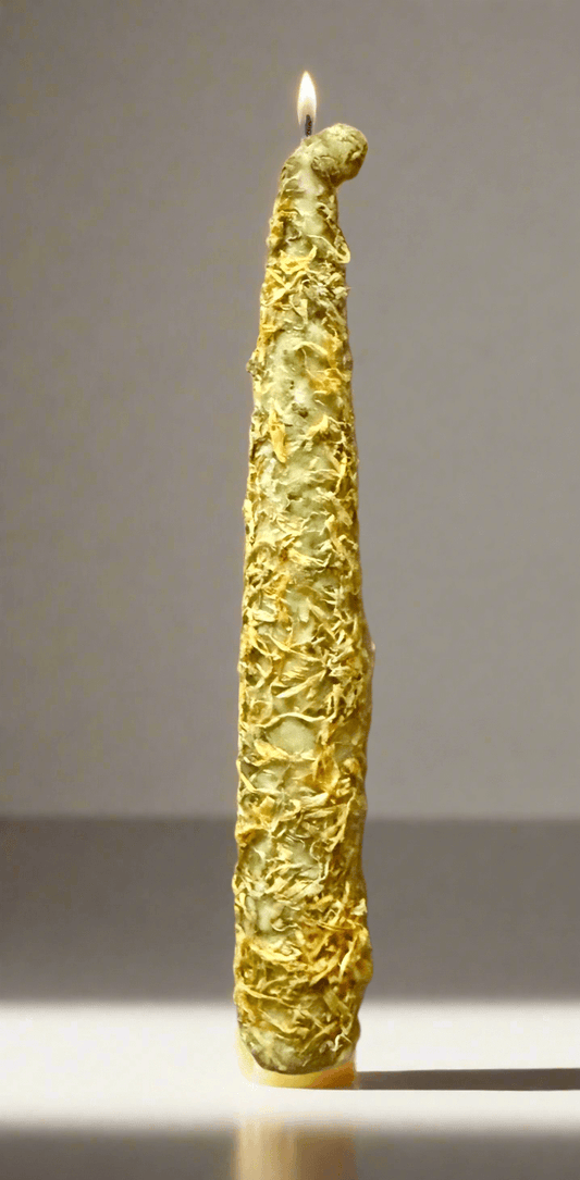 Golden Marigold Protection Ritual Candle, 8-inch soy taper candle, lit with a unique textured design for spiritual rituals.