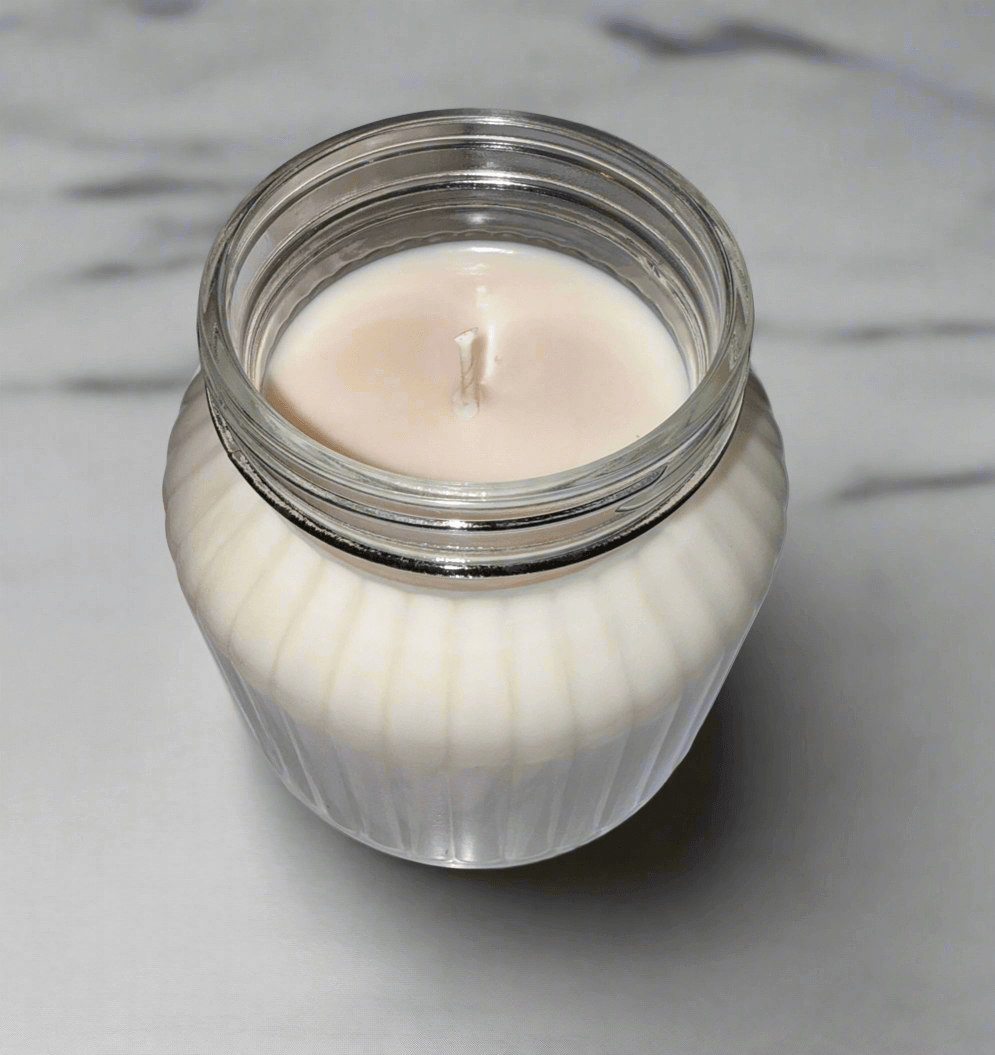 Extra large 24 ounce glass jar candle with the scent Froot Loops.